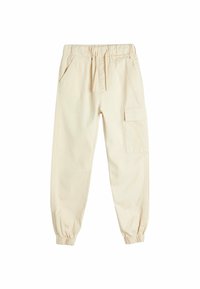 Beige cargobukser lavet af bomuld, med elastisk talje, sidelommer og en enkelt cargolomme på det højre ben. Elastiske manchetter.