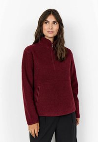 Bordeaux fleece pullover met kwartrits en lange mouwen, van gestructureerde stof, met zijzakken, featuring een slim fit en platte naden.