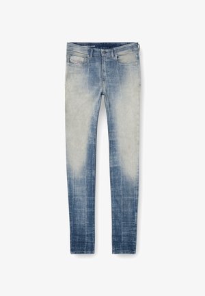 Lyst håndvaske denimjeans med en falmet blå gradient, fem-lomme design, lige benpasform og subtile slidmærker på fronten.