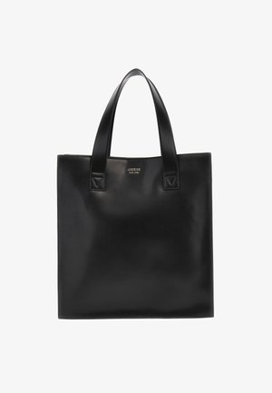 Czarna skórzana torba typu tote z dwoma uchwytami i małym logo "GUESS EST 1981" tłoczonym na przednim środku.