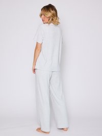 Light gray ribbed pajama set with short sleeves and wide-leg pants. Soft texture, relaxed fit, and subtle pattern detail.