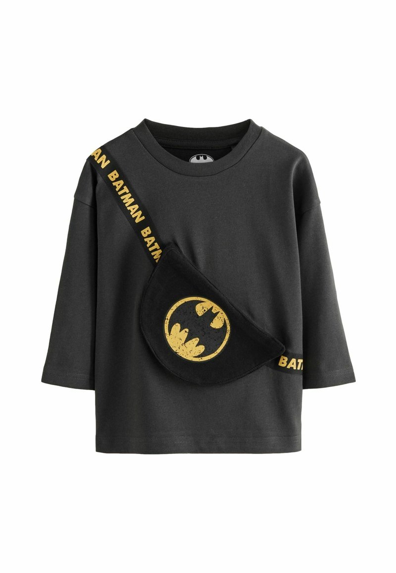 Schwarzes Baumwoll-T-Shirt mit einer Batman-Logo-Tasche, ausgestattet mit einem goldenen Logo und gelbem "BATMAN"-Text auf dem Trageband. Langes Ärmeldesign, lässig und bequem.