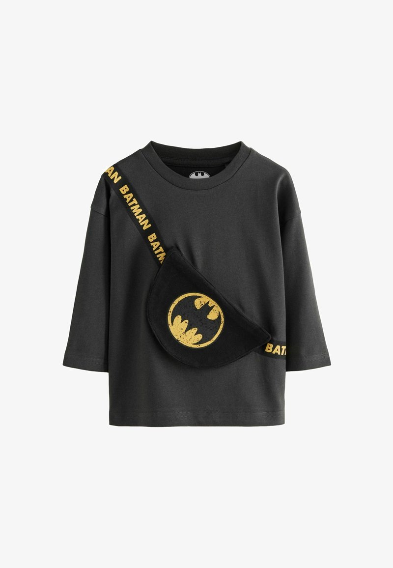 Schwarzes Baumwoll-T-Shirt mit einer Batman-Logo-Tasche, ausgestattet mit einem goldenen Logo und gelbem "BATMAN"-Text auf dem Trageband. Langes Ärmeldesign, lässig und bequem.