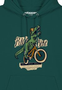 Teal hoodie met een graphic van een dinosaurus die op een fiets rijdt. De tekst luidt "Ride Bike" en "The Best Days" in een vintage stijl.