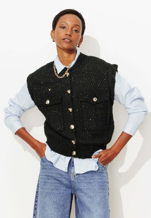 IRISÉ SANS MANCHES - Veste sans manches - noir