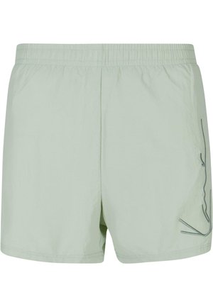 Helles grünes Shorts aus leichtem Material, mit einem elastischen Bund und einem schlichten grafischen Design auf der linken Seite.