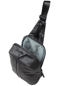 Black, waterproof sling bag with a zippered closure, adjustable strap, and a smooth blue interior lining. Features a front pocket and sleek design.