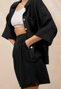 Next Šortky - black