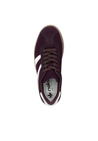 Dark purple suede sneaker with white striped accents, brown laces, and a rubber sole. Features a cushioned insole for comfort.