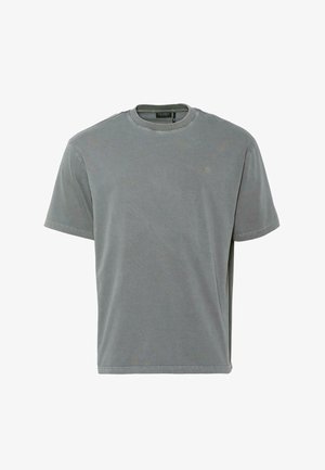 Pilkas medvilnės marškinėlis su apvaliu kaklu, trumpomis rankovėmis ir laisvu siluetu. Savybė - mažas logotipas ant krūtinės ir dvigubai siūti kraštai.