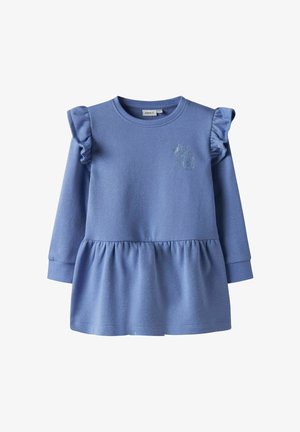 Vestido azul de manga larga con hombros con volantes, cintura peplum y bordado brillante de unicornio. Hecho de tela suave con un acabado texturizado.