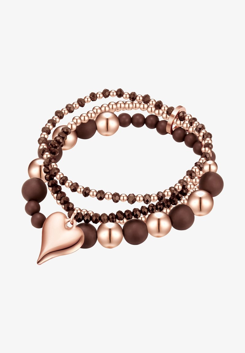 Pulsera elástica que presenta hebras de cuentas en tonos marrón y oro rosa con acabados mate y brillante. Un encantador en forma de corazón acentúa el diseño.