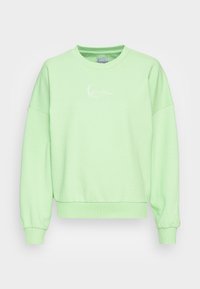 Světlounce zelená mikina s dlouhým rukávem s žebrovanými manžetami a lemem, s malým bílým vyšívaným logem uprostřed přední části.