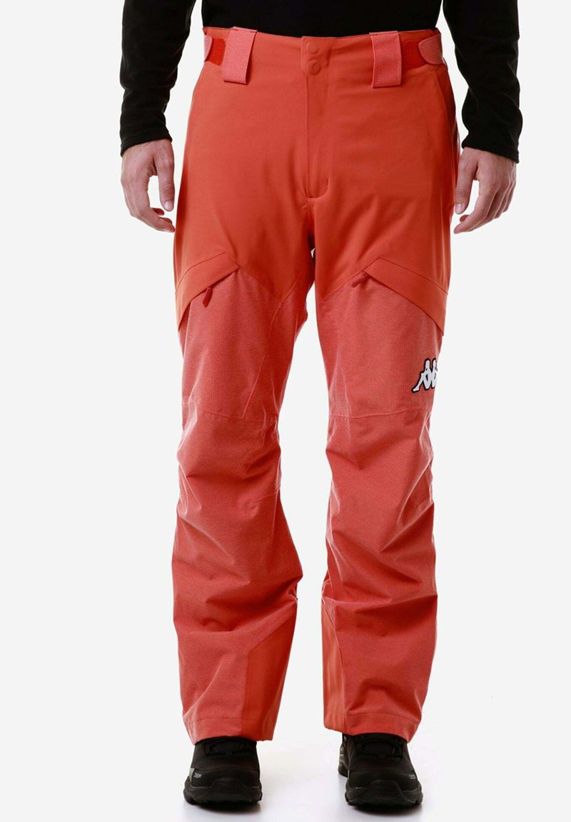 Pantaloni da sci arancioni realizzati in tessuto resistente, con una vestibilità dritta, vita regolabile e dettaglio del logo sulla coscia sinistra.