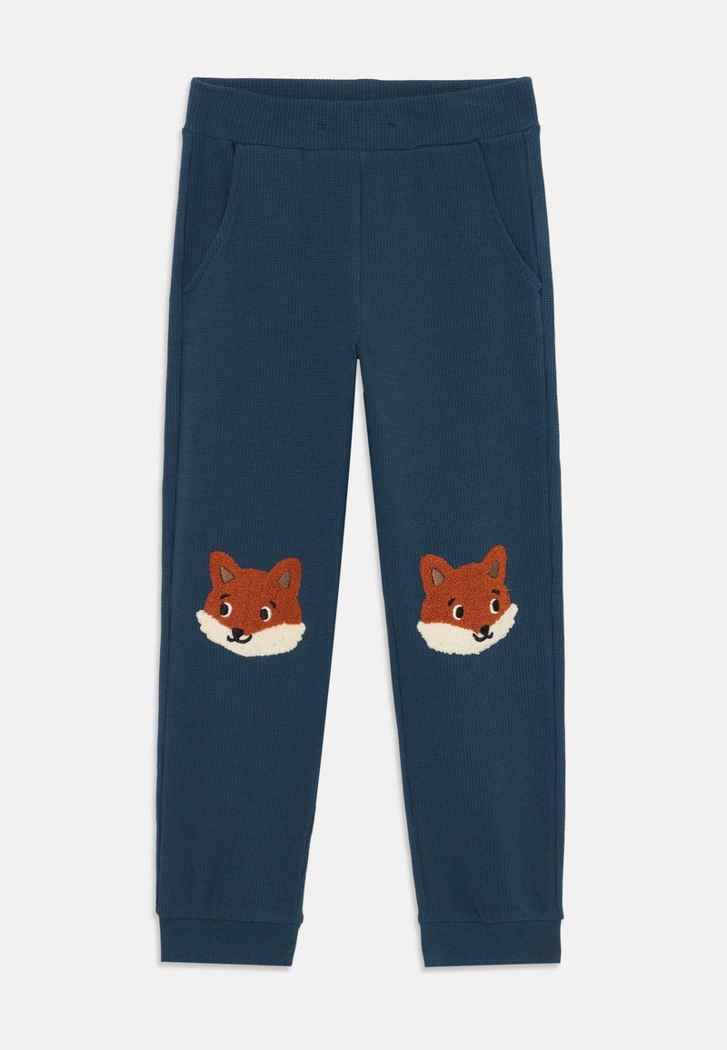 Navy blue cotton blend pants with a textured surface, featuring two appliquéd fox faces on the front. Elastic waistband and side pockets.