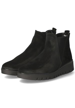 Black suede ankle boots with a textured side panel, pull tabs, and a thick rubber sole featuring a ridged pattern.