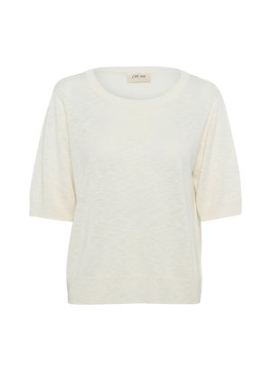 Kremkrāsas adīts tops ar apaļu kakla izgriezumu, īsām piedurknēm un nedaudz teksturētu audumu, kas piešķir papildus detaļas.