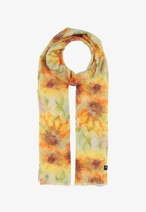 Sciarpa leggera con stampa di grandi girasoli gialli e arancioni e foglie verdi su sfondo crema, bordi frangiati.