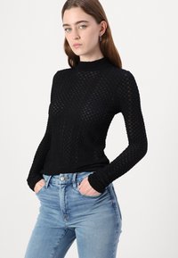 Good American BABY STEP HEM - Jeans Skinny Fit - indigo