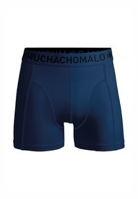 Temno modre bokserice iz elastičnega materiala, s črnim elastičnim pasom z logotipom "MUCHACHO" ter gladko in trajno zasnovo.