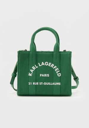 Green textured fabric tote bag with dual handles and adjustable strap, featuring white "Karl Lagerfeld Paris 21 Rue St-Guillaume" text.
