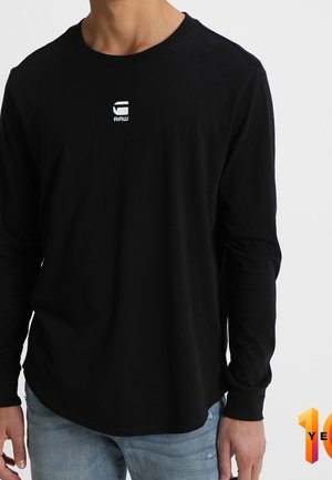 Långärmad tröja - black