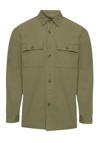 Camisa de botón verde oliva con cuello clásico, dos bolsillos en el pecho y botones marrones. Fabricada con un tejido texturizado y tejido.