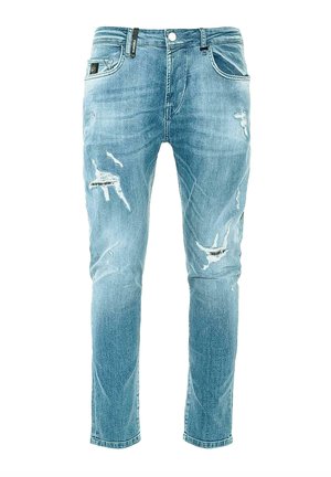 Lyseblå denimjeans med slim fit, der har slidte lapper og udvaskede områder. Fem-lomme design og knaplukning ved taljen.
