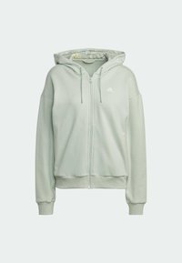 Sweat à capuche zippé gris clair avec poches avant, capuche à cordon avec doublure imprimée et petit logo Adidas sur la poitrine.
