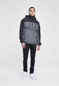 Karl Kani RETRO SPLIT  - Windbreaker - black
