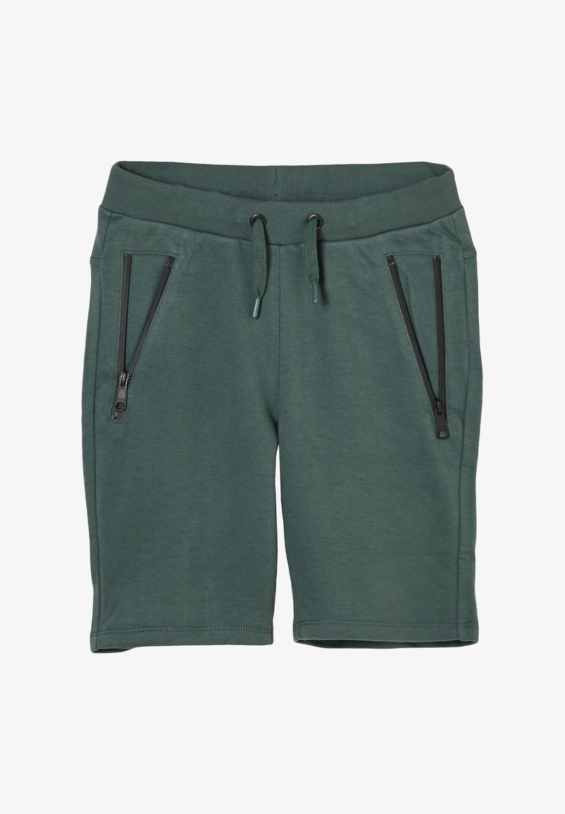 Shorts verts foncés jusqu’aux genoux avec ceinture élastique, cordon de serrage et deux poches zippées à l’avant.
