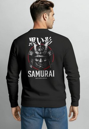Black sweatshirt featuring a samurai helmet graphic, white and red accents, and Japanese text. Text reads "SAMURAI NEVERLESS" at the bottom.