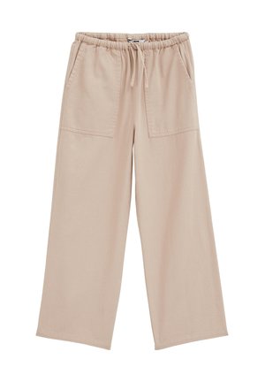 Pantalon beige à jambes larges avec taille élastique, cordon de serrage et grandes poches plaquées à l'avant.