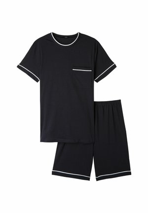 Set di pigiama nero a maniche corte realizzato in tessuto morbido, con scollo a girocollo, dettaglio tasca e accenti bianchi su maniche e pantaloni.
