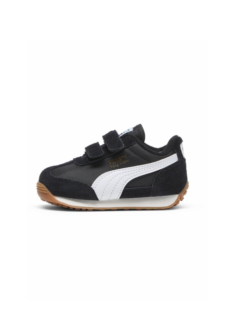 Schwarz-weißer Sportschuh aus Wildleder und Textilmaterialien, ausgestattet mit zwei Klettverschlüssen und einer Sohle aus Gummi. Standardgröße für Kleinkinder.