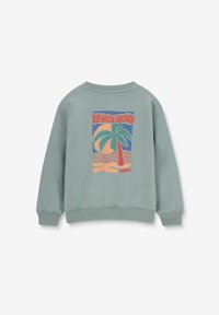 Sweatshirt vert clair à coupe décontractée. Présente un graphique coloré "Venice Beach" avec des palmiers et des vagues au dos. Poignets côtelés.