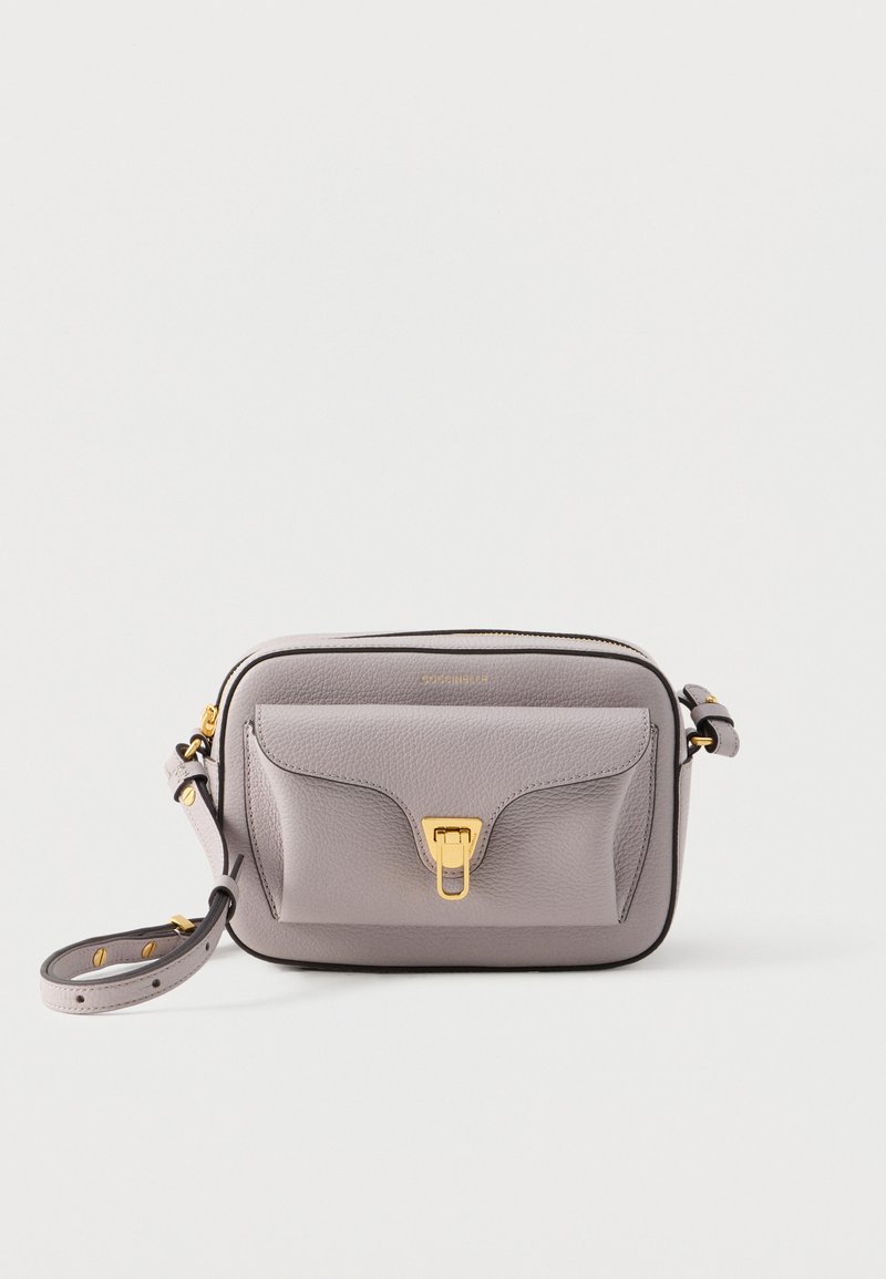 Gray leather crossbody bag with textured surface, gold-tone hardware, single front pocket, and adjustable strap. Zipper closure on top.