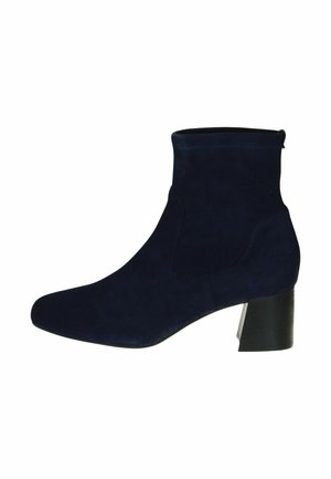 Navy suede ankle boots with a block heel, pointed toe, and elastic side panels for easy wear. Smooth texture and sleek design.