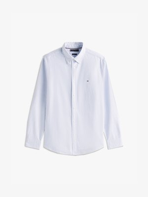 Hemd in Hellblau mit weißen Streifen. Verfügt über einen Kragen, lange Ärmel und ein kleines Logo auf der Brust. Aus Baumwollmaterial.