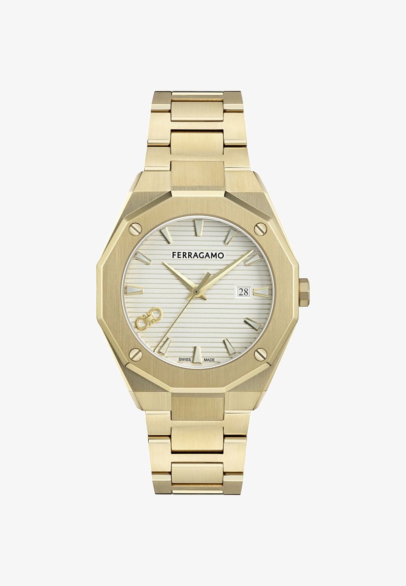 Auksinis Ferragamo rankinis laikrodis su aštunkampiu rėmeliu, sidabriniu dryžuotu ciferblatu, auksiniais valandų žymekliais, datos langu prie 3 valandos ir metaline grandinėle.