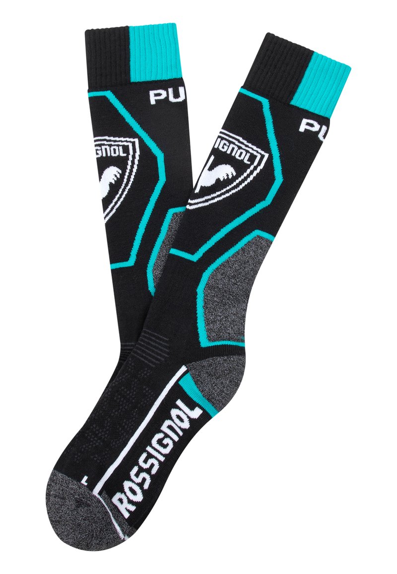 Polvisukki, jotka ulottuvat polveen, mustat, turkoosivivahteiset, harmaassa kantapäässä tekstuuria ja valkoinen "ROSSIGNOL" -logo jalan päällä. Kuusikulmainen kuvio.
