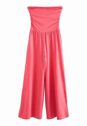 Koralroosa õlgu vabastav jumpsuit, millel on kokku volditud rind ja laiad säärte disain. Valmistatud siledast, kergest kangast, et tagada mugav istuvus.