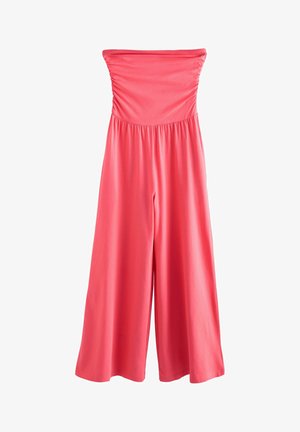 Koralroosa õlgu vabastav jumpsuit, millel on kokku volditud rind ja laiad säärte disain. Valmistatud siledast, kergest kangast, et tagada mugav istuvus.