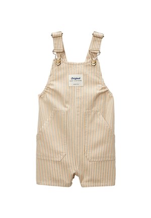 Salopette courte pour bébé à rayures verticales beige et blanche avec poches avant et bretelles réglables avec fermoirs métalliques et une étiquette « Original Baby Clothing ».