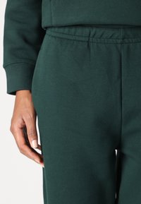 Lacoste Tepláky - sinople
