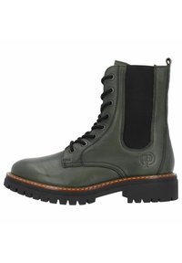 Combat-style boot in dark green leather with black elastic side, black lug sole, and decorative stitching. Features logo detail on the side.