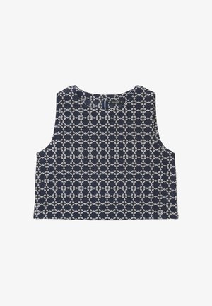 Haut court sans manches bleu marine avec un motif de chaîne blanche entrelacée et une petite fermeture éclair au dos.