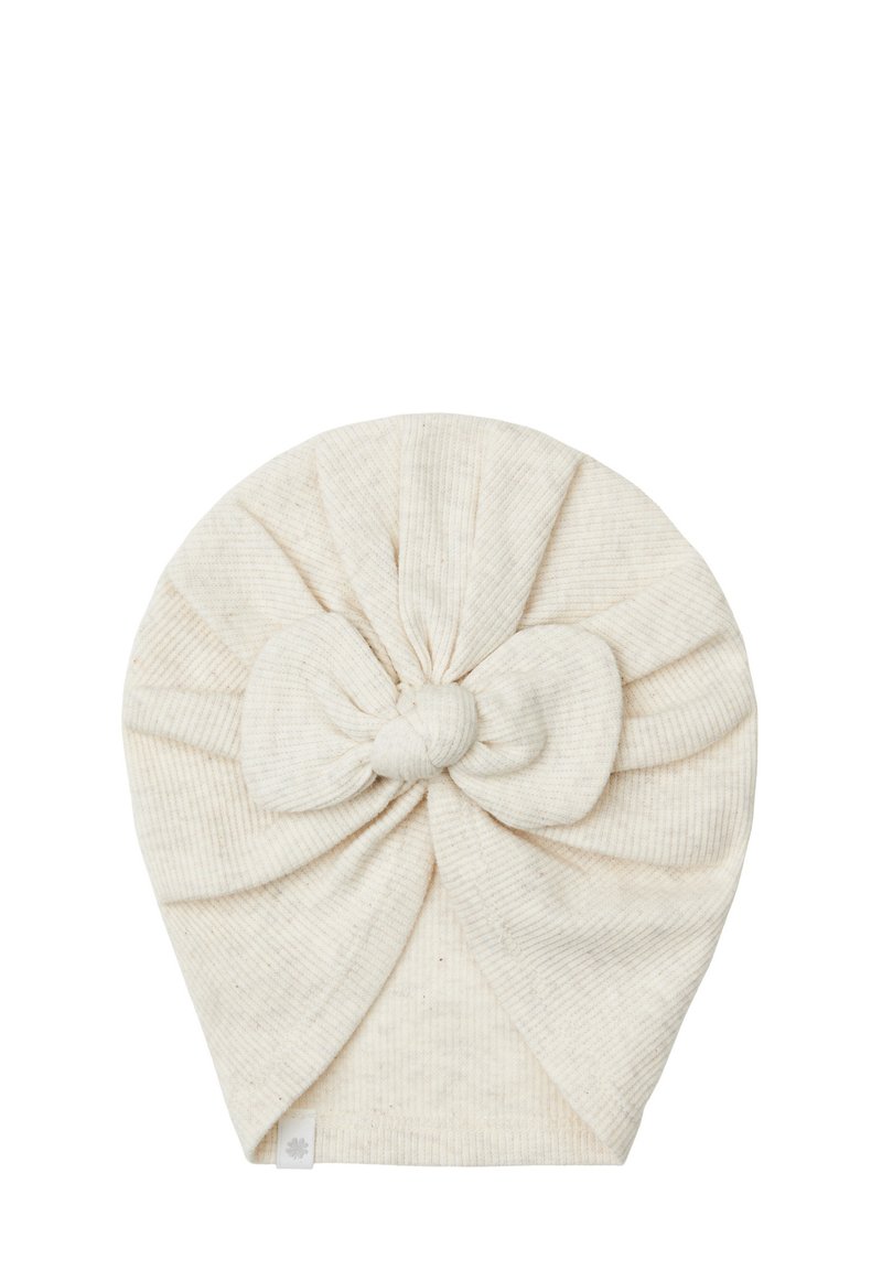 Un bandeau en tissu beige clair, présentant un design de nœud noué à l'avant avec une texture côtelée subtile et des extrémités arrondies.