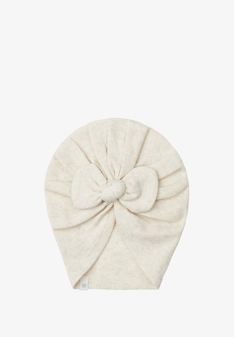 Un bandeau en tissu beige clair, présentant un design de nœud noué à l'avant avec une texture côtelée subtile et des extrémités arrondies.