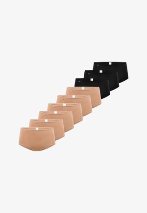 Neuf culottes en deux couleurs : quatre noires et cinq nude. Chacune possède une ceinture douce et élastique avec une petite étiquette à l'avant.